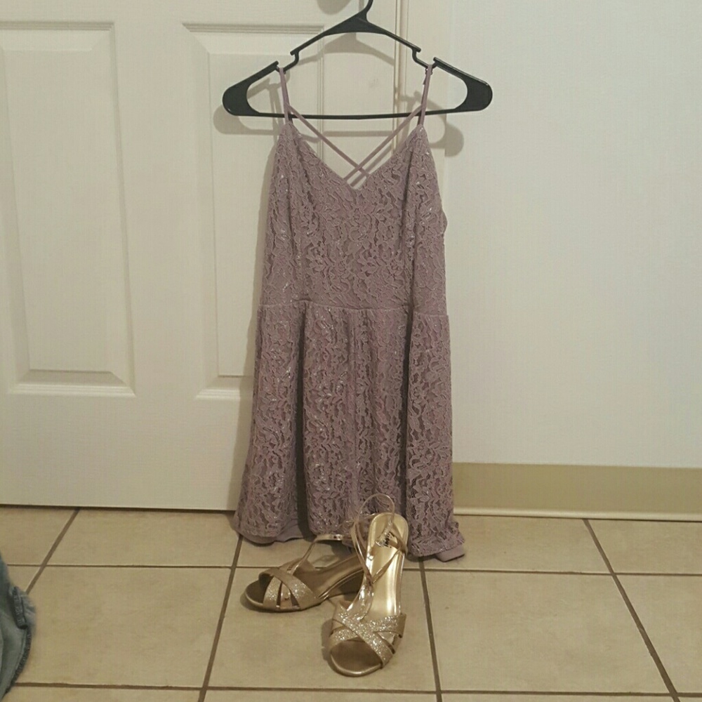 Purple dress with gold shoes